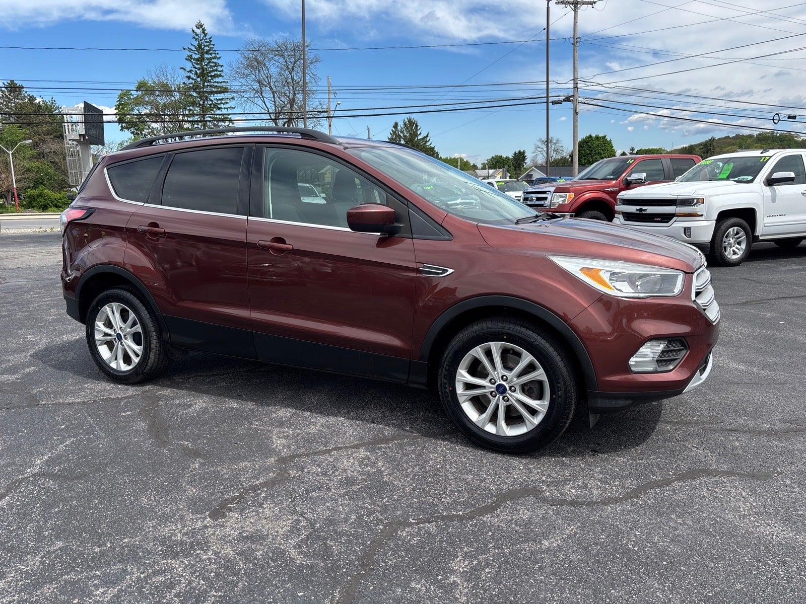 2018 Ford Escape SE in Cinnamon Glaze — front three-quarter view