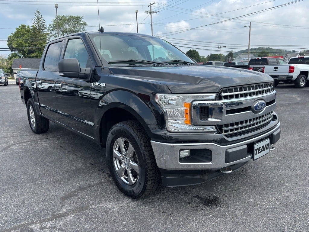 2018 Ford F-150 XLT in Shadow Black — front three-quarter view