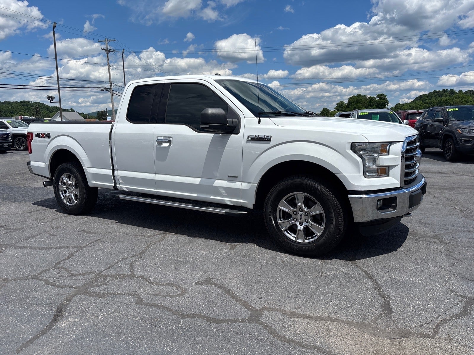 2016 Ford F-150 XLT in Oxford White — front three-quarter view