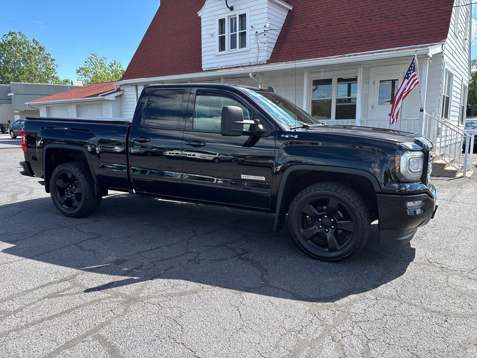 2016 GMC Sierra 1500 Base in Onyx Black — front three-quarter view