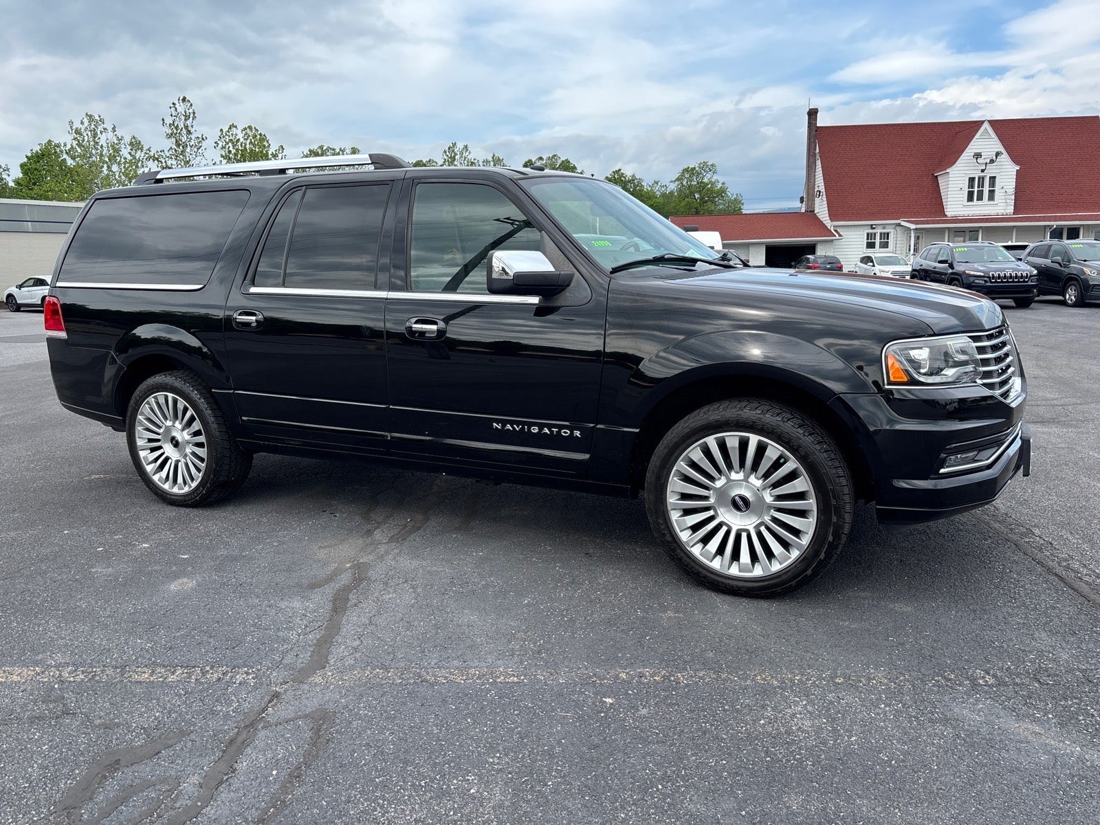 2017 Lincoln Navigator L Reserve in Black Velvet — front three-quarter view